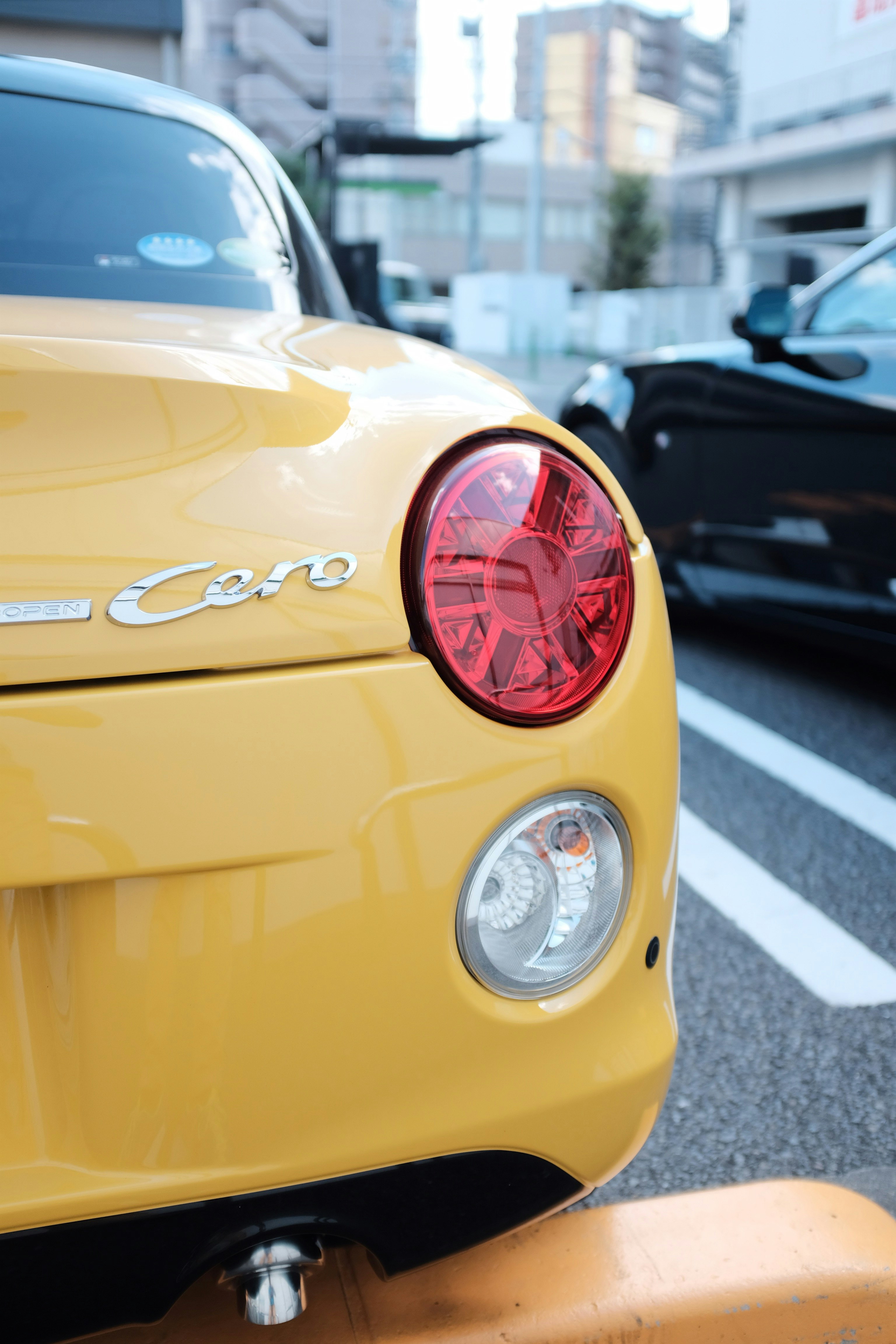 yellow and black cars on road